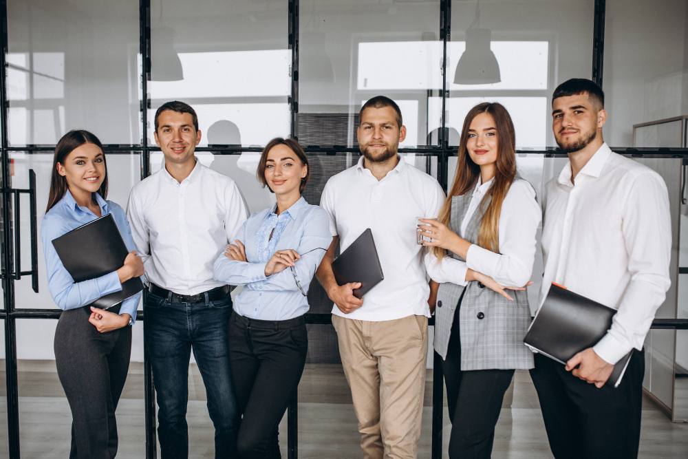 group-people-working-out-business-plan-office